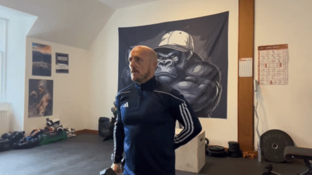 Dumbbell pass hold