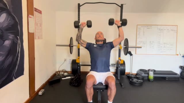 Seated dumbbell shoulder press