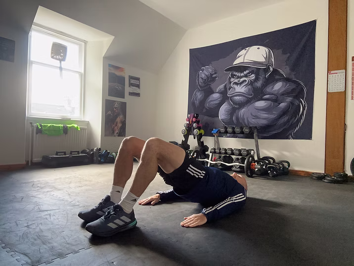 A glute bridge, lying on your back with hips lifted